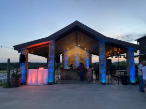 DJ and lighting set up for the bringers of the party, Beatmode DJs at El Cerrito Lodge in Diana, TX for a summer Texas wedding in deep East Texas.